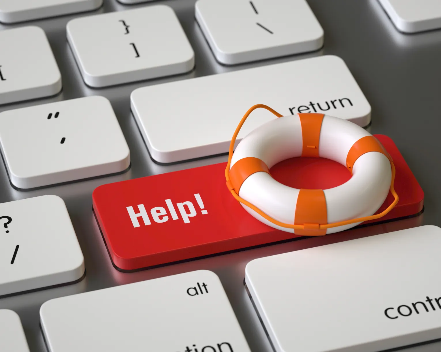 A white keyboard with a red key below "return" that says "Help!" and has a life raft.