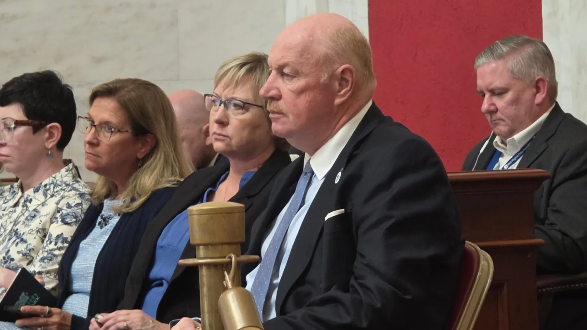 EWV Co-Presidents listen to the WV PEIA Evaluation Report during Joint Standing Committee on Insurance and PEIA at the legislature on Sept. 9, 2025.