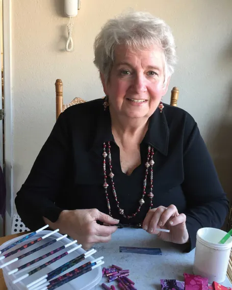 Judith Genone handcrafts beads